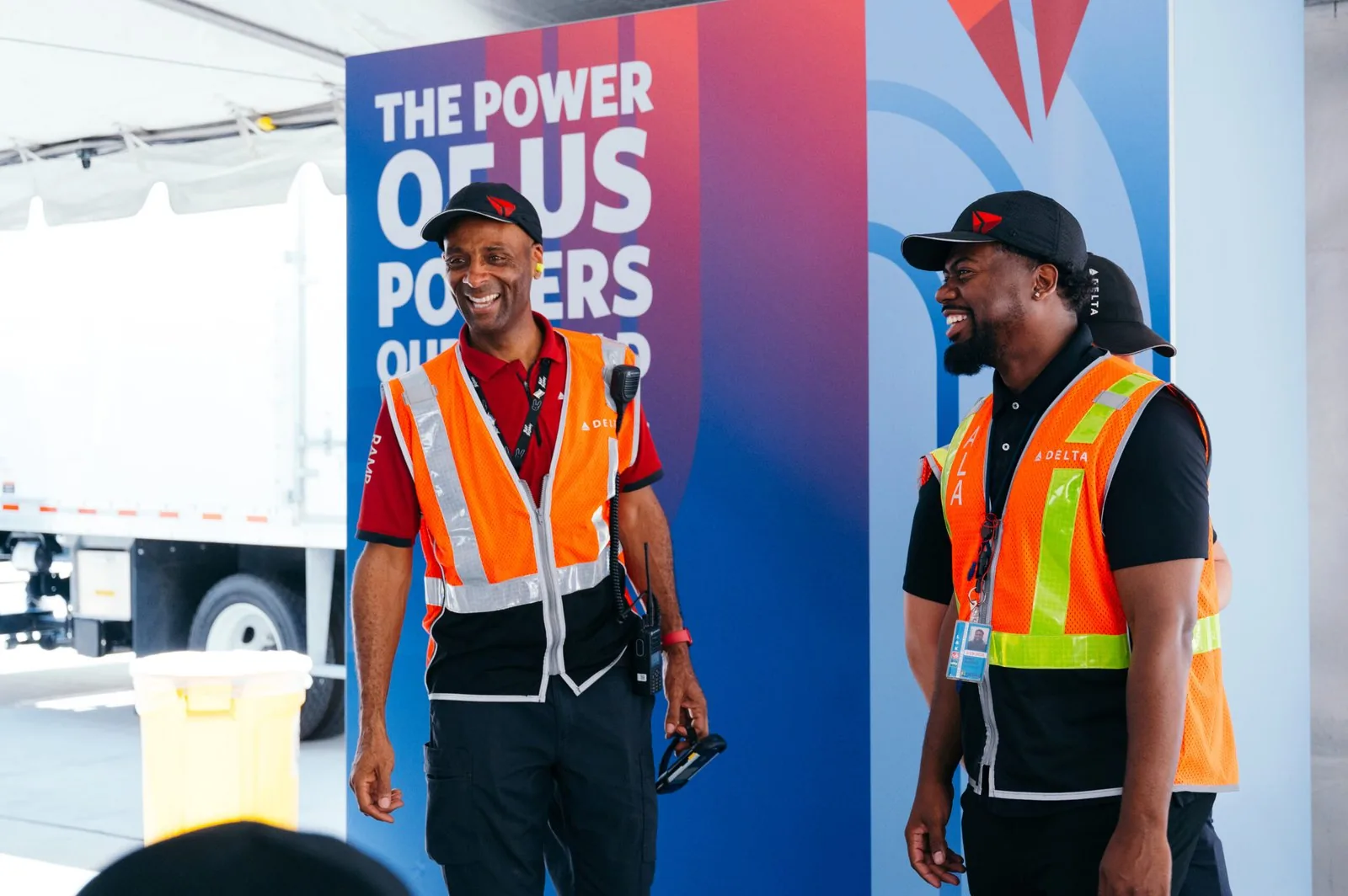 Delta Power of Us Party environmental column wrap and branded event signage